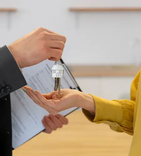 A landlord confidently managing a property under a guaranteed rent scheme, showcasing stress-free income.